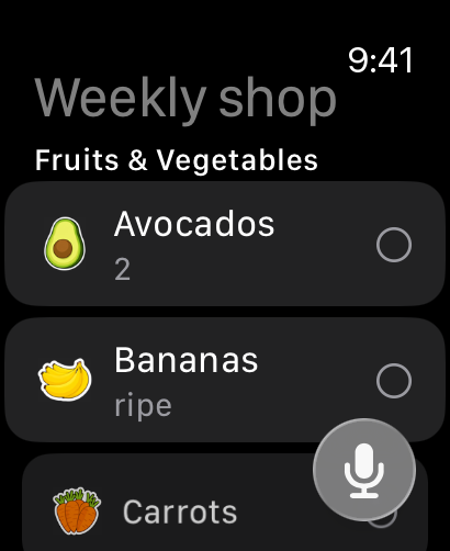 The same list on Apple Watch: avocados, ripe bananas and carrots, with a microphone button